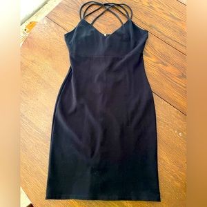 Womens tight black dress. Size M